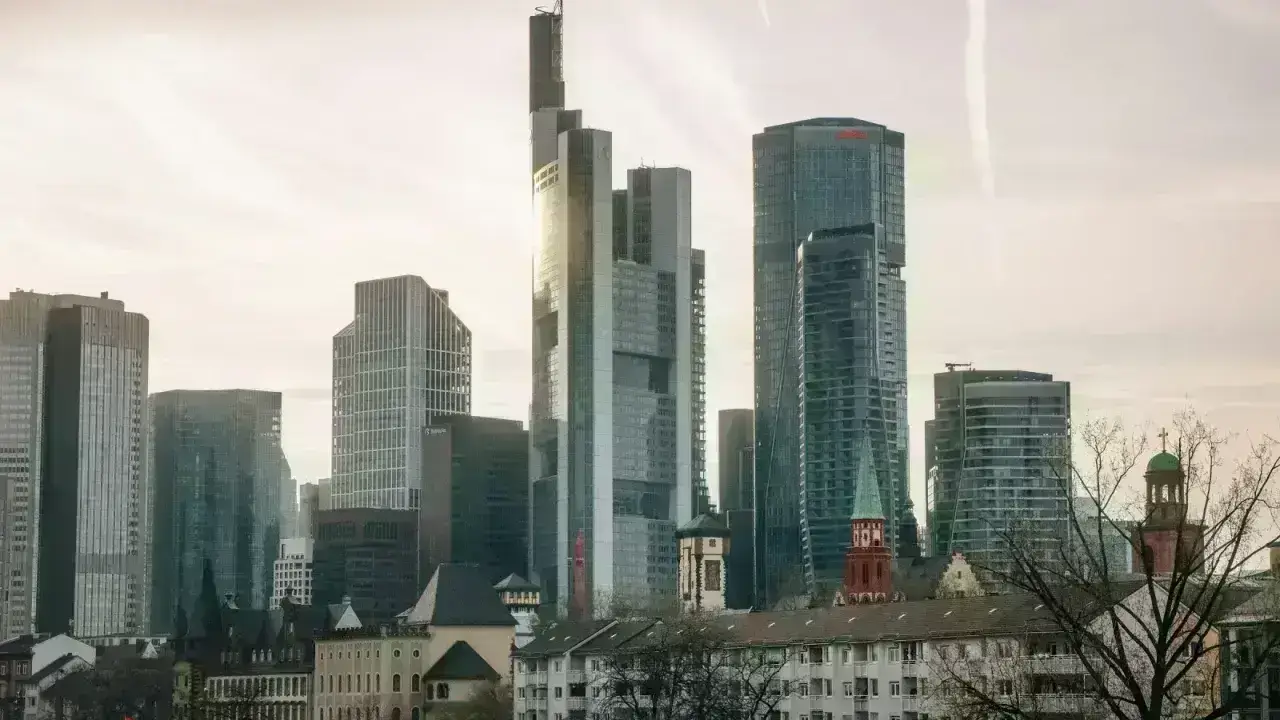 Financial district skyline representing capital markets used to transfer catastrophe risk