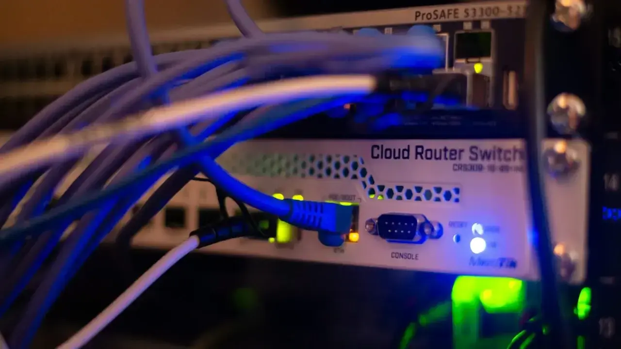 Rows of server equipment in a data center, illustrating first-party and third-party cyber insurance exposures