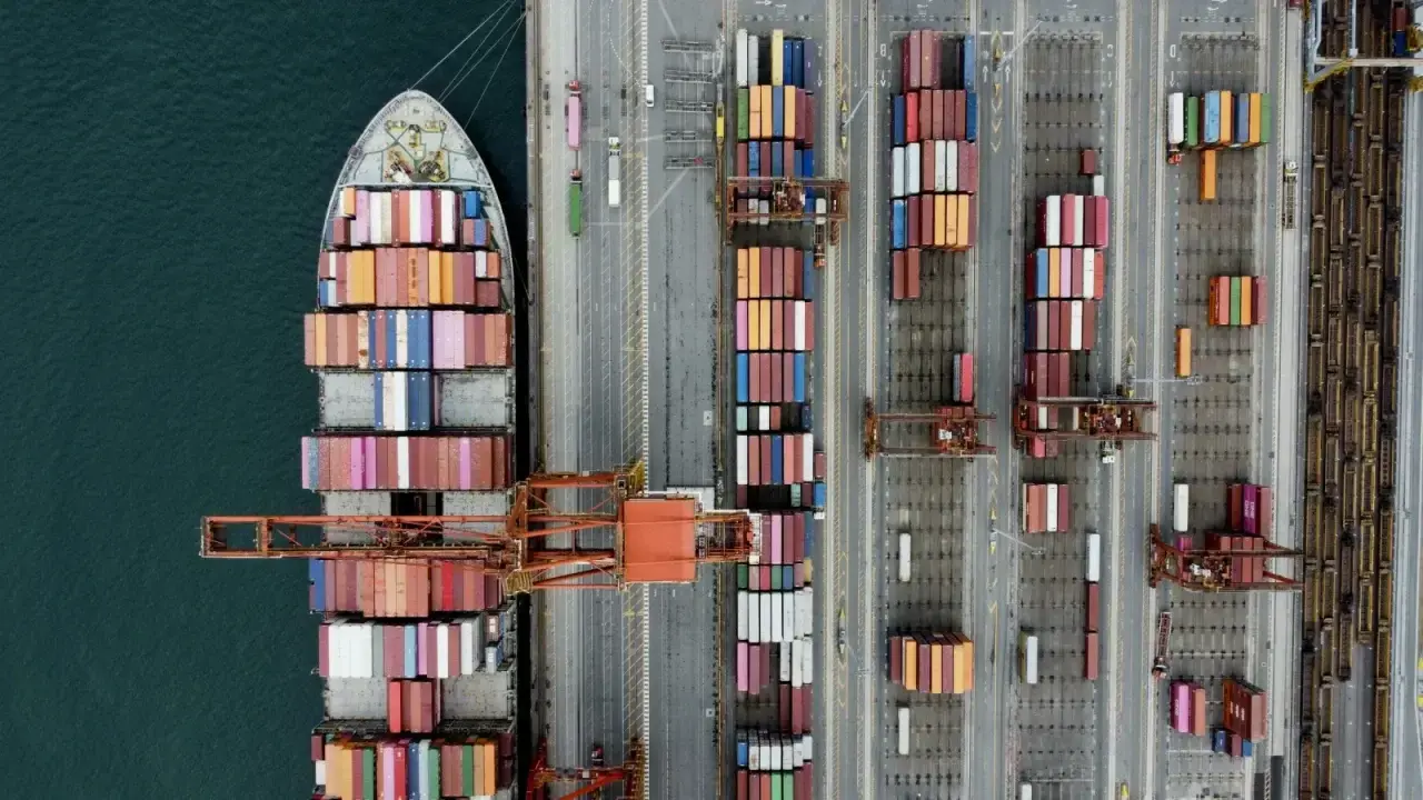 Container ship at a global port illustrating marine cargo insurance and supply-chain risk