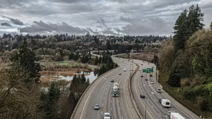 Busy highway traffic in the United States representing auto insurance exposure