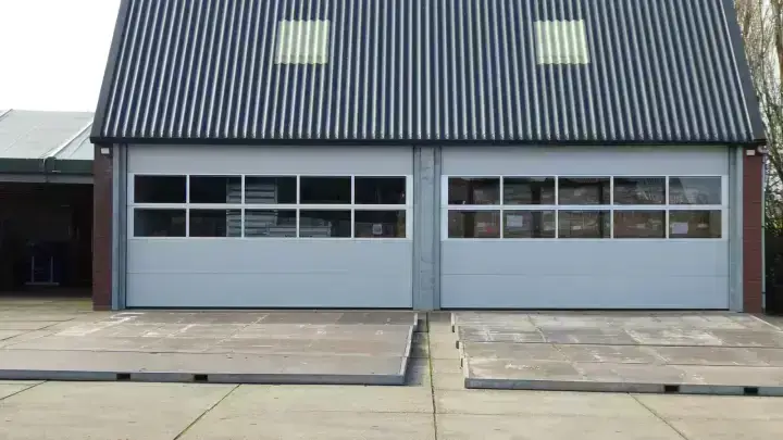 Modern warehouse exterior illustrating commercial property valuation and insurance replacement cost