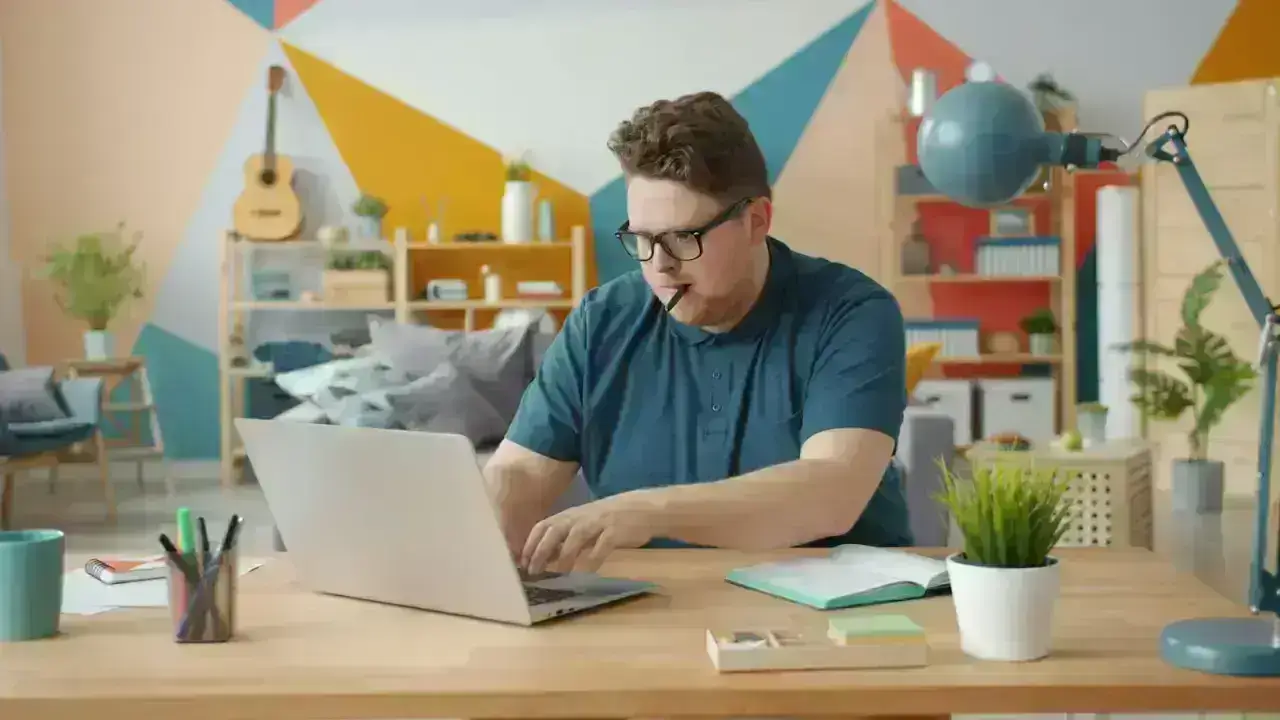 Person working from a home office illustrating insurance needs for a home-based small business