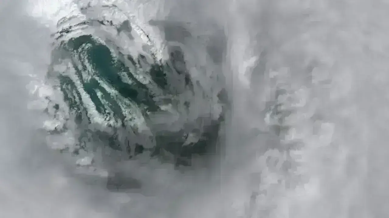 Satellite view of a hurricane eye over the ocean, illustrating catastrophe industry-loss triggers used in reinsurance and retrocession