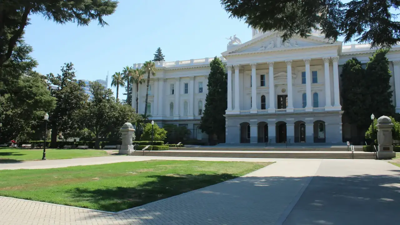 California State Capitol building, illustrating state-based insurance rate regulation and filing systems