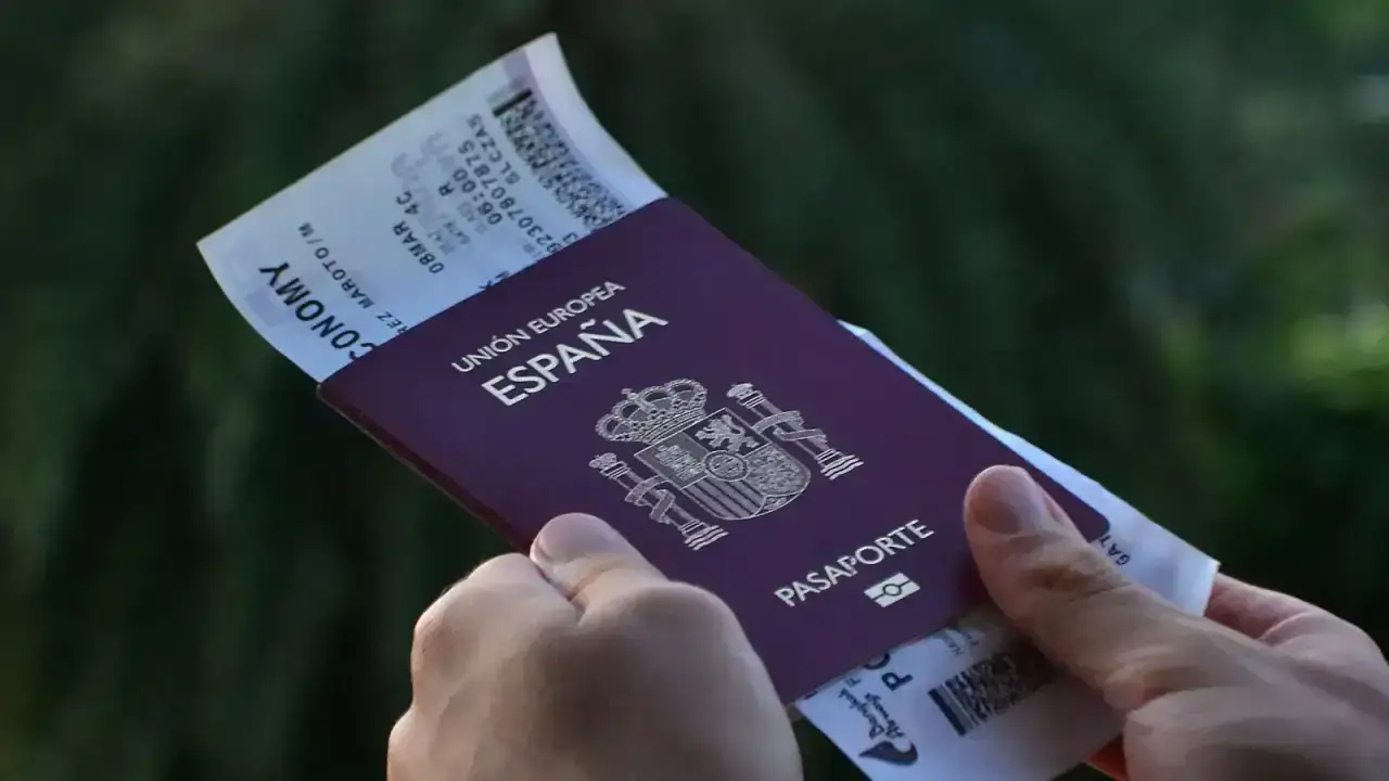 Passport and boarding pass on travel luggage illustrating lost passport travel insurance guidance