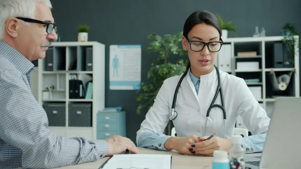 Doctor consulting with an older patient, illustrating Medicare coverage choices