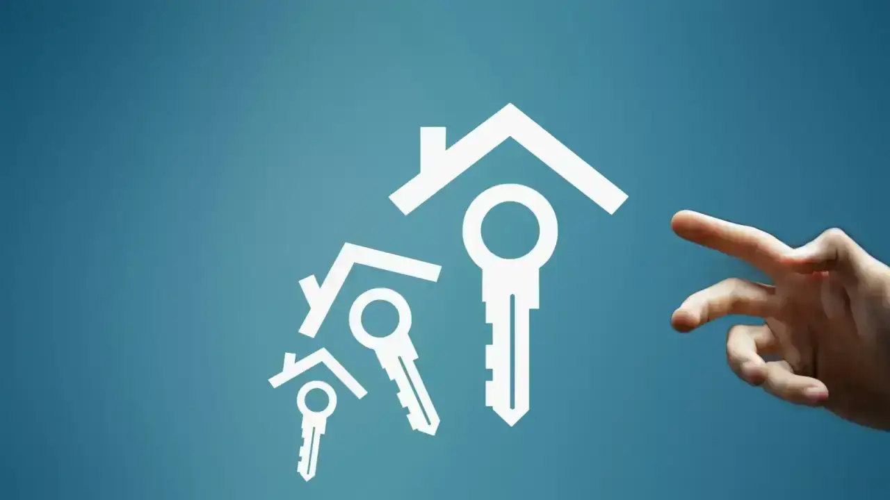 Hand reaching toward a house and key concept, illustrating a mortgaged home and insurance repair funds