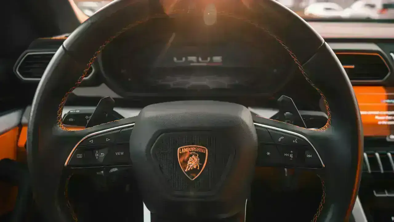 Driver behind a steering wheel in a car, illustrating non-owner auto liability insurance for people who drive vehicles they do not own