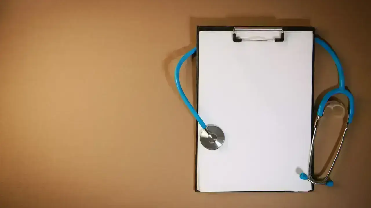 Stethoscope and medical clipboard illustrating health insurance prior authorization and care review