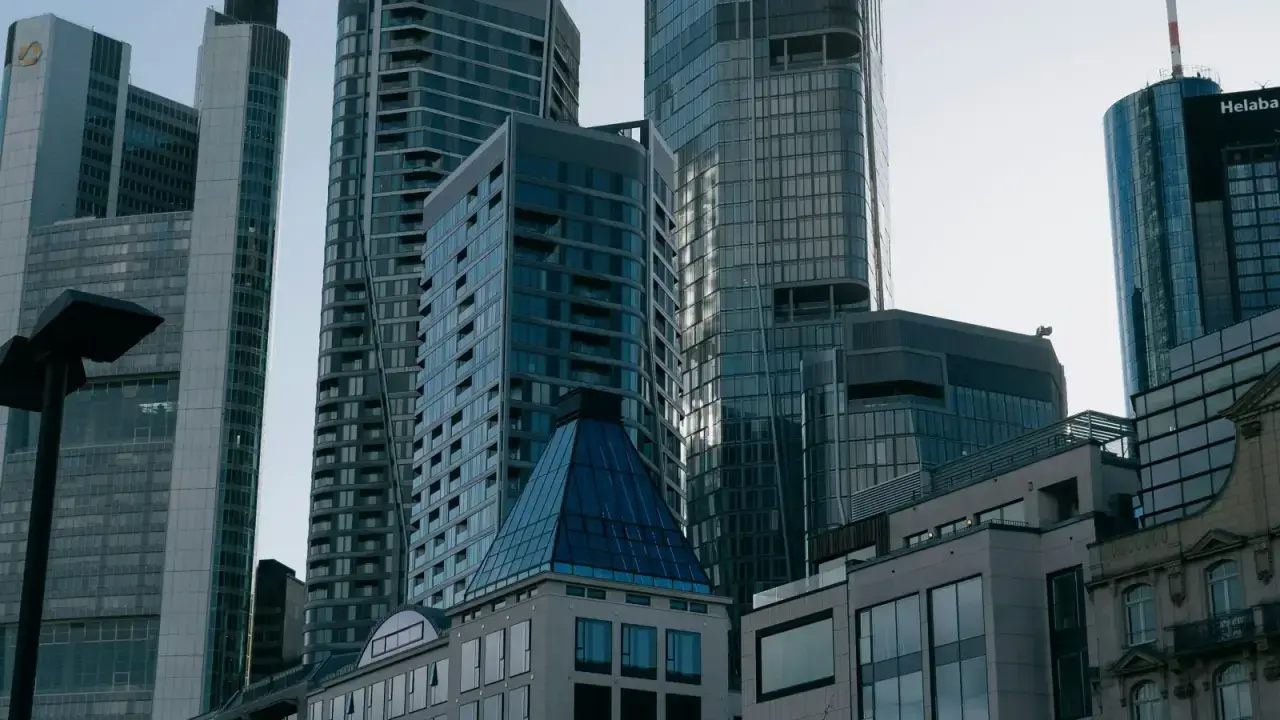 Modern financial district skyscrapers illustrating global reinsurance and retrocession capital