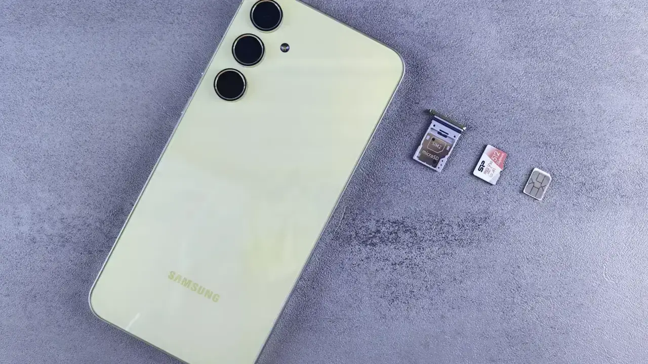 Smartphone with SIM cards illustrating SIM swap fraud and personal cyber insurance response