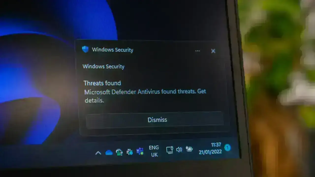 Laptop displaying security controls, illustrating phishing and social-engineering fraud risks for cyber insurance